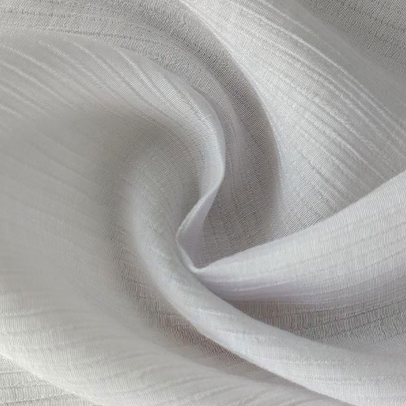 Tessuto in rayon/nylon a filamento singolo 4:1 fortemente ritorto con trama increspata