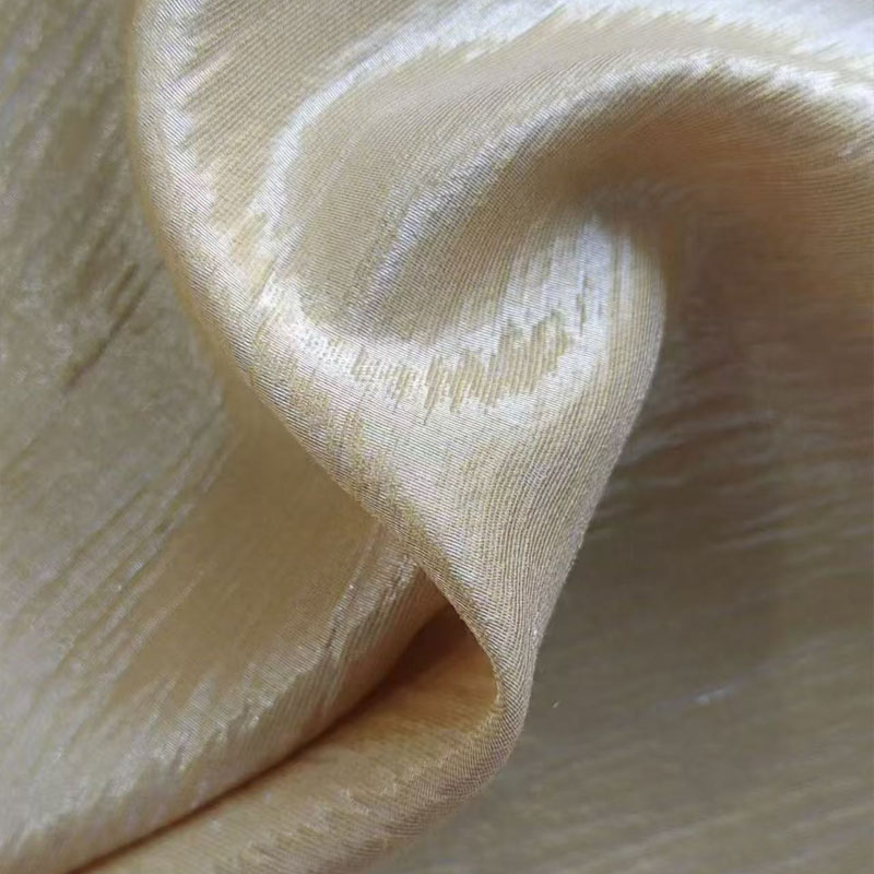 Perché il tessuto jacquard in nylon è la scelta migliore per l'abbigliamento moderno?