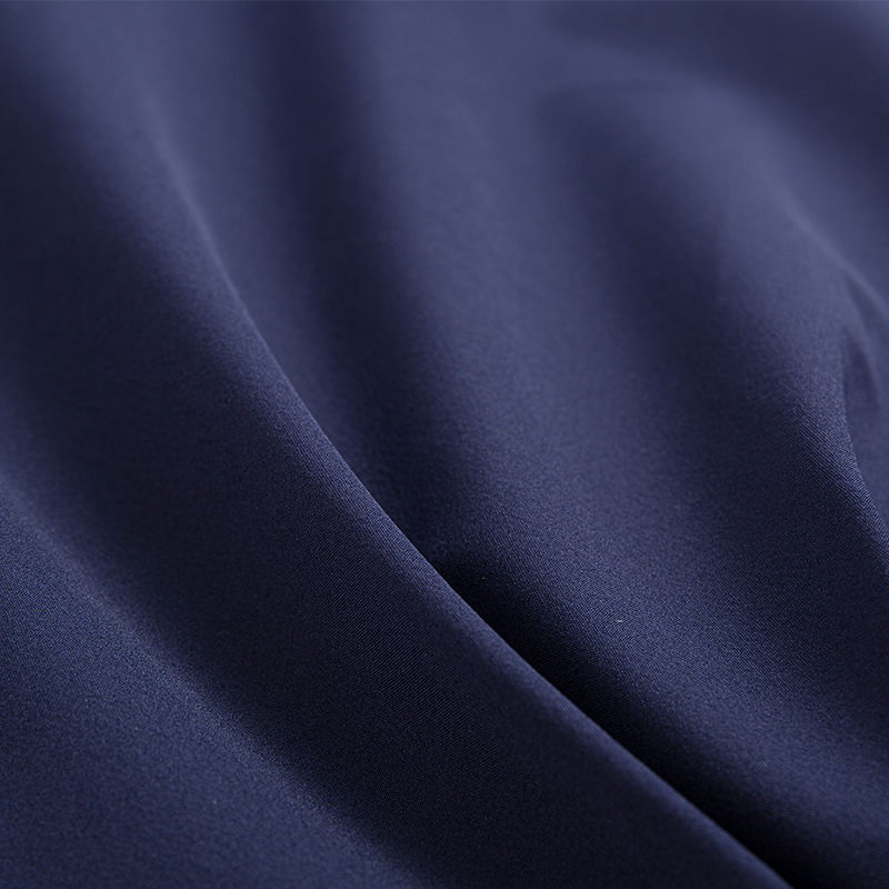 Nylon elasticizzato in quattro direzioni da 190 g/m² con membrana bianca e rete traspirante in PTFE - Tre in uno